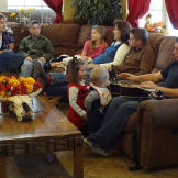The family prepares for its morning meeting.