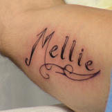 The tattoo artist sketched the design as "Millie." Good thing she caught the mistake before it became permanent!