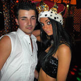 Priscilla poses with birthday boy Tommy at his gypsy royalty-themed party.