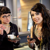 Megan Massacre and Jessica Gahring eating lunch.