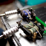 Tattoo guns and razor.