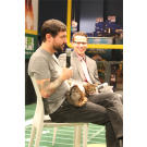 Lil Bub and her dude, Mike Bridavsky, answer questions at The Puppy Bowl Experience in Times Square.