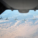 Six F-16 Fighting Falcons wait their turn to be administered fuel from a KC-10 over Afghanistan during Operation Enduring Freedom. In 2009, KC-10s from the 380th AEW and the 908th EARS flew 4,760 combat sorties offl-loading 422,222,300 pounds of fuel.