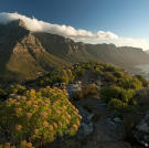 Table Mountain shrouded beneath the billowing "Table Cloth" clouds. This icon of the continent overlooks Africa's southernmost tip, the Cape of Good Hope, where the cold Atlantic Ocean meets the warm Indian Ocean to create spectacular clouds over Table Mountain. But the interaction between these two great oceans does more than just create clouds; it shapes the whole of Africa's southern Cape.