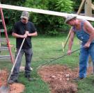 Tim and Tickle hard at work on their new still house.