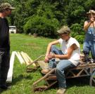 Tim, Tickle, and JT take a break from their backyard construction project.