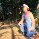 Tim takes in the woods.