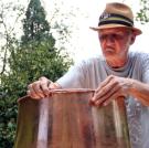 Jim Tom builds a traditional copper still.