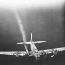 This Flying Fortress continues on despite damage to engine number 3.