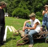 Tim, Tickle, and JT take a break from their backyard construction project.