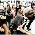 Jim Goodwin, 19 Kids and Counting sound man signing autographs. He's famous now too!
