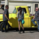 Billy Derian Sr. and head mechanic Mike Dade talk to Kelsi about what can be done to save her screamin' yellow pickup truck.