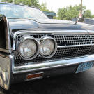 A Lincoln Continental, a replica of JFK's Presidential limousine.