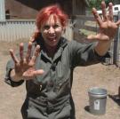 This is what Kari looks like when she gets pig poop on her hands.