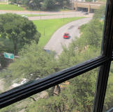 A view from the Sniper's Window onto Dealey Plaza.