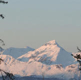 Soft light on the mountains with snow.