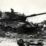 A knocked out Israeli M60 tank amongst the debris of other armor after an Israeli counterattack in the Sinai during the Yom Kippur War, 1973.
Watch video of