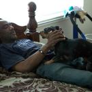 Patrick Major's kidney disease drove him into a deep suicidal depression. On dialysis for five years, he would lie in bed for days at a time, unable to perform simple activities. Then, Patrick's girlfriend, Sabrina, read about pets helping people deal with emotional stress. Days later, the couple adopted a dachshund who had a penchant for playing catch. They named him Sammy. On days Patrick wanted to burrow in his bed, Sammy demanded he play catch with balls or pieces of paper. Patrick credits Sammy for pulling him out of his depression and more importantly, keeping him alive long enough to receive the greatest gift of all -- a new kidney. Patrick is now healthy and off dialysis. He and Sammy Davis remain inseparable and after all his practice, Sammy has won several major dog competitions.
