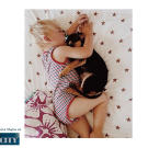 Beau's mother captured these adorable images of the two cuddling in bed.