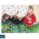 So, one day while she was rocking Beau before his daily nap, Theo climbed up and joined. As she wrote in her blog, "I was practically howling at the cuteness-and nearly woke them both up."
