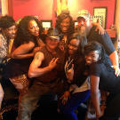 Turtleman (Ernie Brown, Jr.) and Neal James pose with the Jazzy Girls from the hair salon.