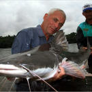 Jeremy Wade holds a 72-pound, 5-foot-long piraiba catfish. These formidable fish can grow to over 10 feet in length and 600 pounds in weight.