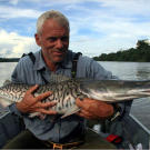 Jeremy Wade with a surubim catfish. This fish has an unusual duck-billed snout and can grow to 4 feet in length.