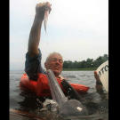Jeremy Wade feeds red-bellied piranhas to an Amazon river dolphin. Also known as the boto or pink river dolphin, the Amazon river dolphin is the largest freshwater dolphin in the world.