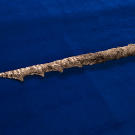 The spears appear to be handcrafted.