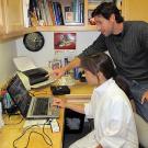 John Fulton with Dr. Jean Chu reviewing security footage
