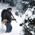 Les Stroud heads off into the dark woods of Norway.