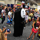 Described as a "mysterious man," No-Face consumes — and vomits — servants and produces gold coins in the film. So these attendees should probably watch out.
