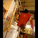 Mike Rowe feeds waste to Miss Piggy (so called because she "eats a lot").