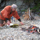 Cody makes torches using moss saturated with motor oil. Slightly damp moss soaked with a heavy fuel makes a excellent slow fire.