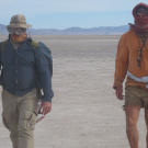 On their way toward the high country rimming the basin, Cody and Dave are caught in one of the frequent dust storms that torment eyes and noses and suck the moisture out of your body at an accelerated rate.