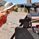 Behold Kari with the launcher for the first RPG (rocket-propelled grenade) in MythBusters history, circa 2011.