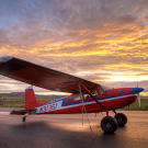 Jim's beloved 1969 Cessna 180 is the only plane he still likes to fly. The 180 is a great bush plane with "tail-dragging" performance that keeps the prop up during off-airport landings.