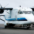 The largest plane in the fleet, a C-23 Sherpa, on the airfield at Barrow, Alaska. It has a maximum payload of 7,000 pounds, but when fully loaded the Sherpa burns through so much aviation fuel that the cargo has to be high-value or essential.