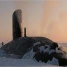 A submarine patrols the Arctic Ocean.
