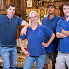 The Gallery 63 crew, from left to right: owner Paul Brown, office manager Cindy Shook, handyman Delfino Ramos and assistant manager/picker Jon Hammond.