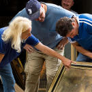 Cindy and Paul examine items as they come right off the truck. Gallery 63 has become well-known for its unique, high-end items.
