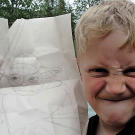 Nine-year-old Hudson Hoffman shows off his Yoda while giving his best impression of a fierce Jedi.