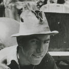 John in front of his 1934 Willy fixing the engine. By this time, John was a top-notch engine mechanic and all around handyman, skills that would serve him well through the years.