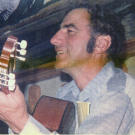 An accomplished musician since his teenage years, John often got out a guitar to entertain at all kinds of gatherings, often performing his own country and bluegrass material.