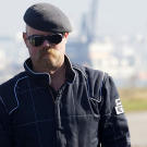 Does shifting the center of gravity in a bus going 50 mph enable it to make sharp turns without flipping over? Jamie Hyneman takes on the movie
