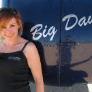 Kari Byron with "Big Dawg," a helicopter used in "Demolition Derby" and "Escape Slide Parachute."