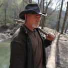 One of the first tools Dave makes is a basic "rabbit stick" that can be used to bring down small mammals. This ancient hunting tool is no more than a one to two inch thick branch about the length of your arm with a boomerang like elbow. With a little practice, the user has a better than average chance of bagging a squirrel or rabbit.