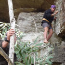 Cody explores along a limestone wall for a good overnight shelter. The limestone outcrops and hills across much of central Appalachia have many recesses and caves that can provide a ready made roof. Native Americans used many of the larger caves and covered ledges for thousands of years.