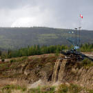 At a claim along the road from Dawson City, a massive wash plant processes multiple tailing streams. Mining operations - past and present - are the most common signs of civilization outside of town.