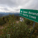 The first sign along the road south from Dawson City that leads down into the Quartz Creek claim area.